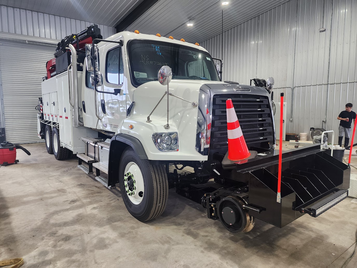 Truck and mounted crane equipment at the Station Truck shop